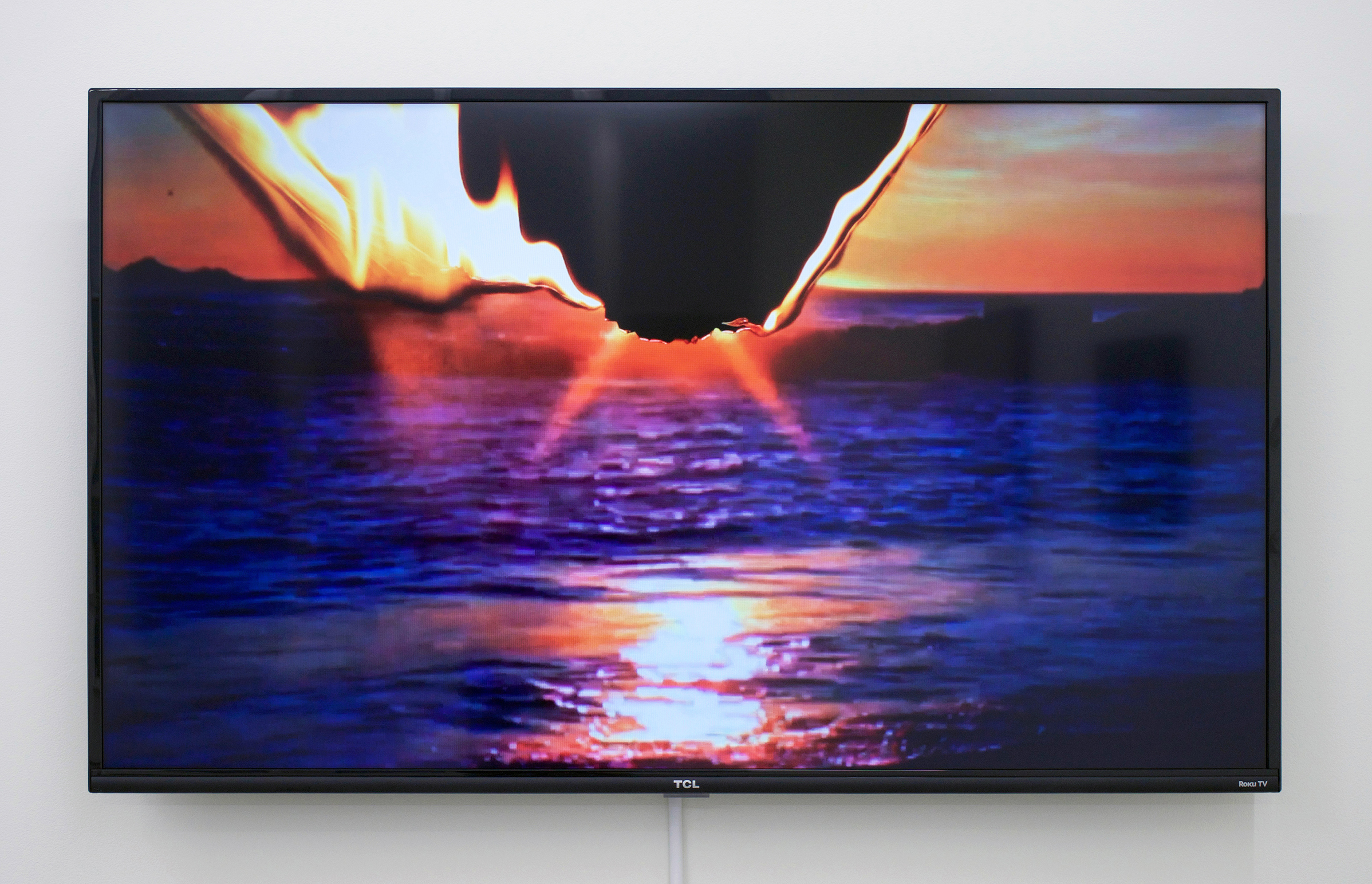  BESSMA KHALAF (alt. image)  Standing On A Beach , 2015 Single channel video with sound, 2min 9sec lood, 50” monitor, Edition of 5 with 1 AP 