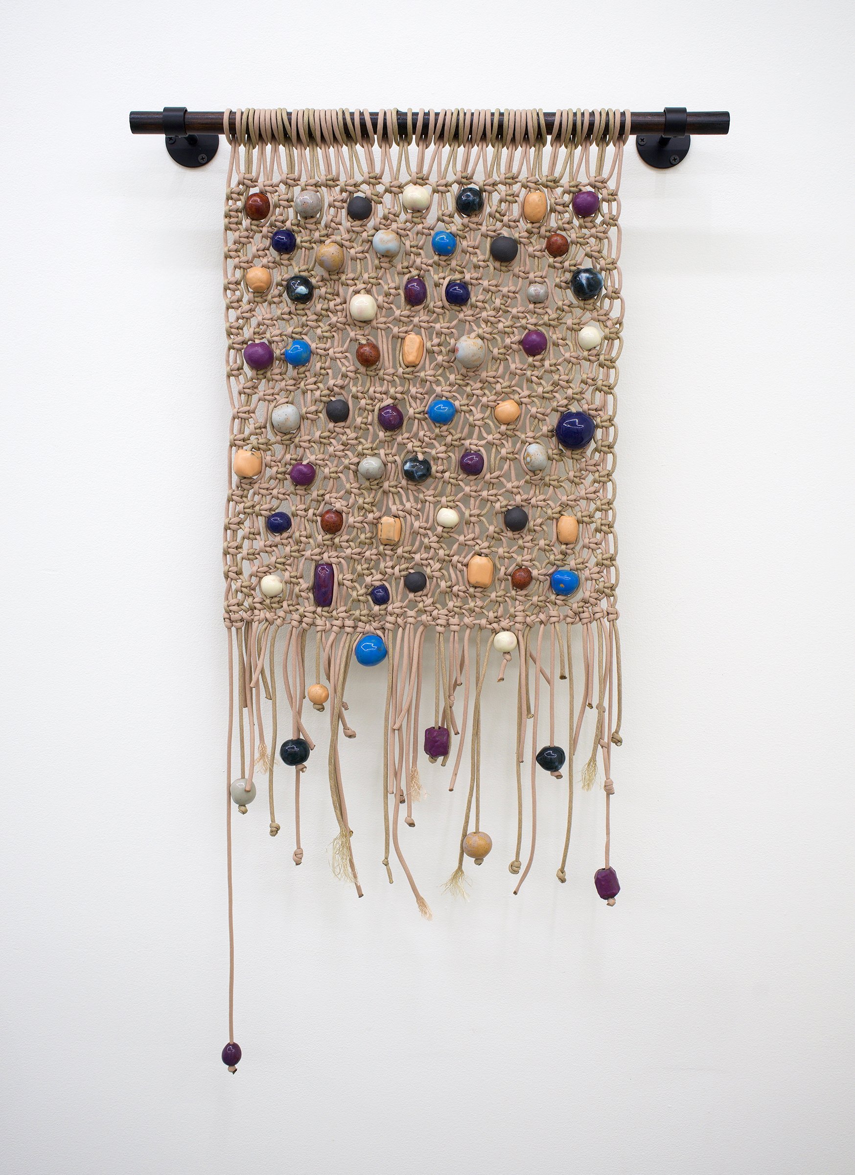   Beige , 2021 Paracord, glazed stoneware beads, charred and stained wood, metal mounts 35” x 20.5” 