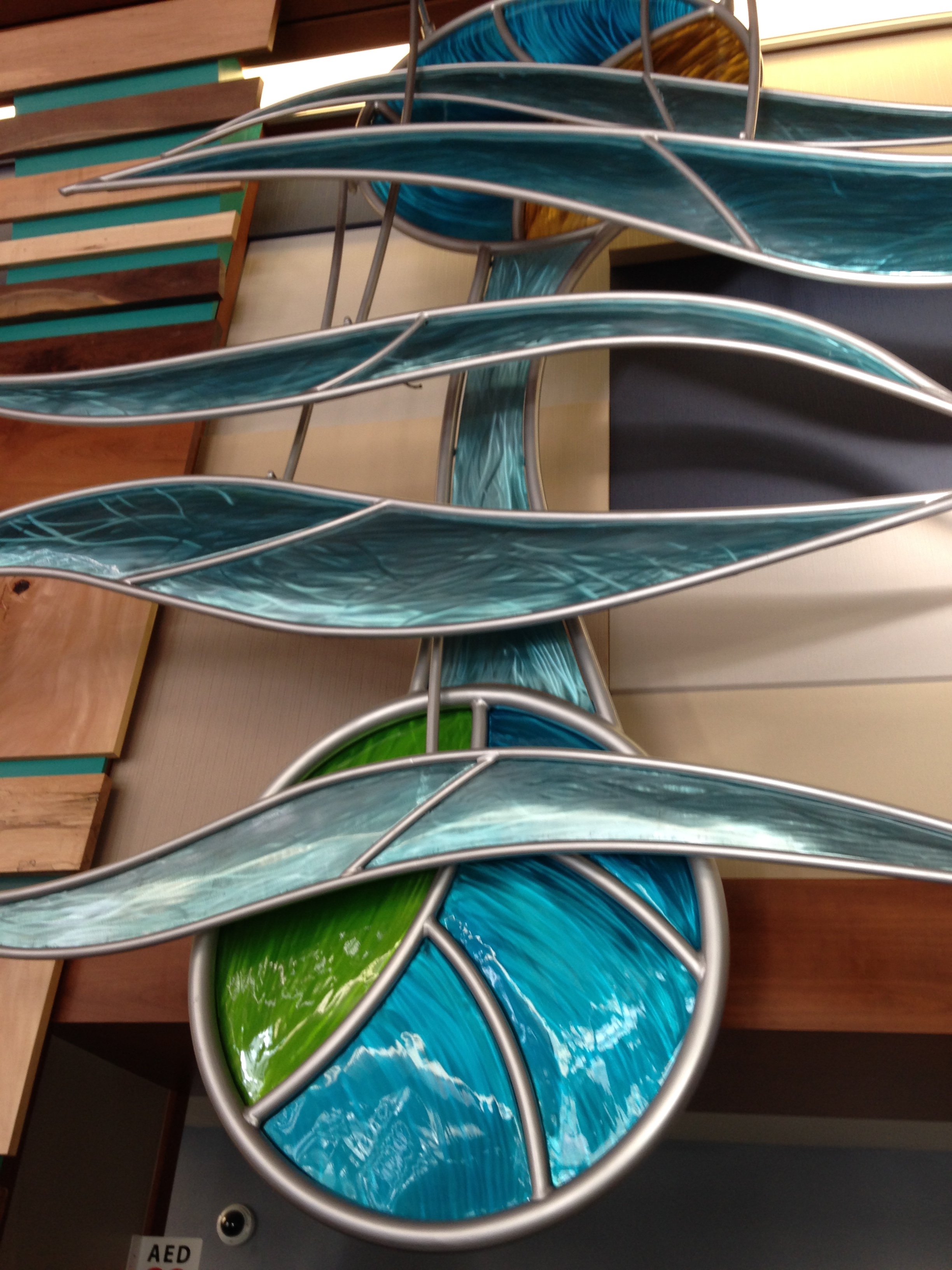 Earth, Sun and Waves , Above Emily Griffith School entrance. Set it waving