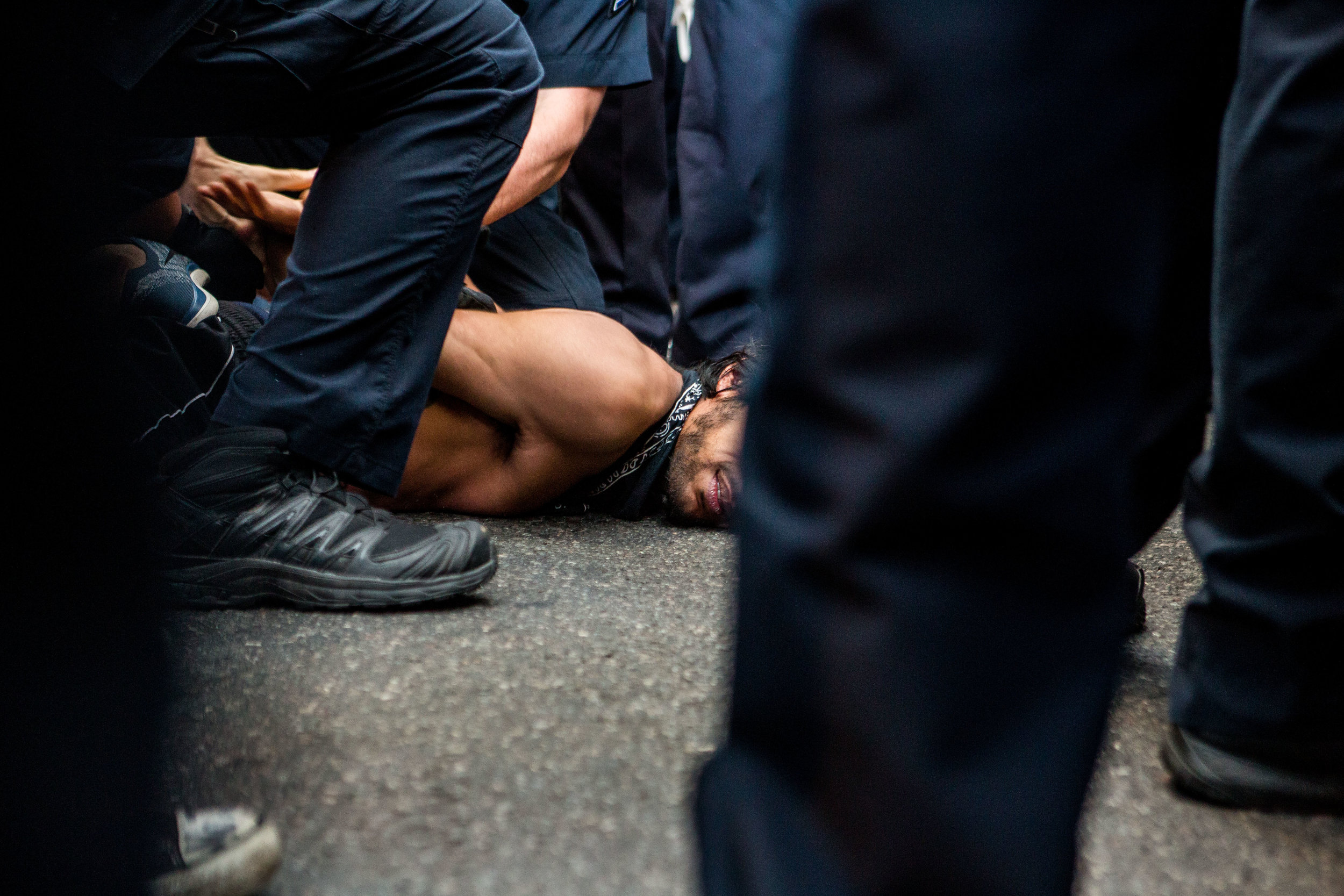  A Black Lives Matter demonstrator is forced to the street and handcuffed in Manhattan, 2016. 