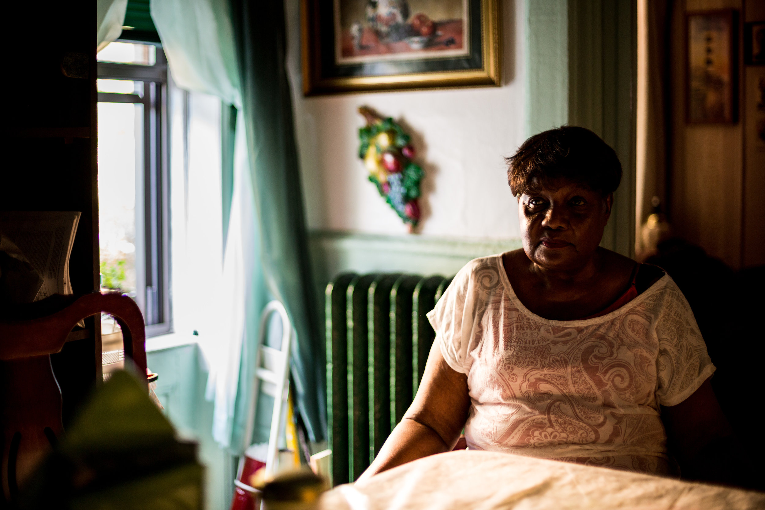  76-year-old Bessie Staton in her Crown Heights home, where she and fellow tenants formed a union and engaged in a rent strike against negligent landlords. Summer, 2016 