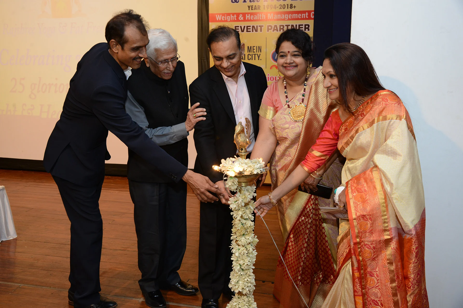 Lighting the Lamps at Rajshree Yoga's Silver Jubilee Celebration. 
