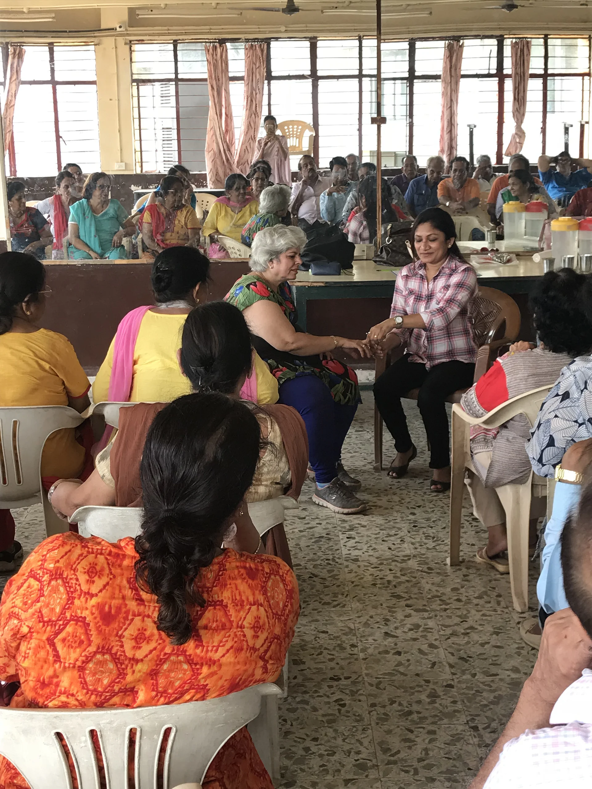  Rajshree Vora giving information on healthcare and pain management with practical demonstration to the members of dignity foundation. 