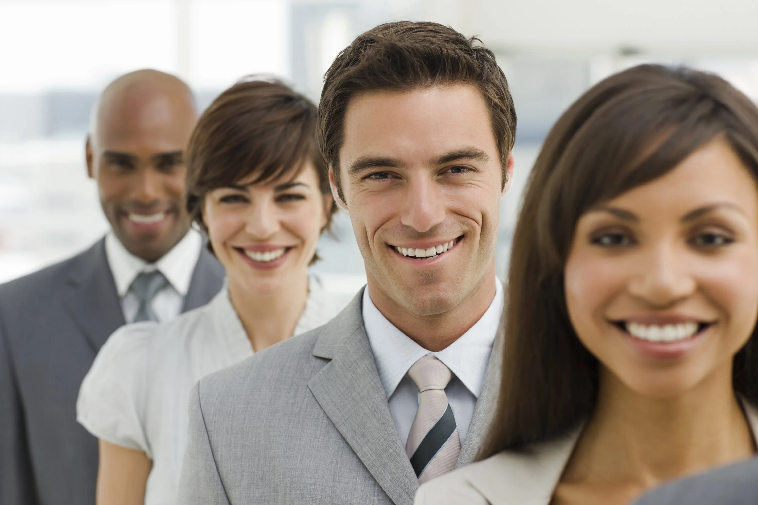 Closeup-portrait-of-happy-business-group-000006792437_Large.jpg