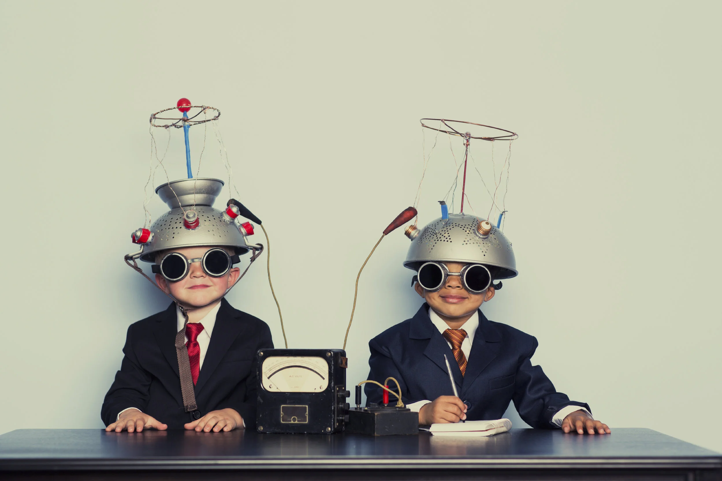 Two-Business-Boys-with-Mind-Reading-Helmets-000038920764_Large.jpg