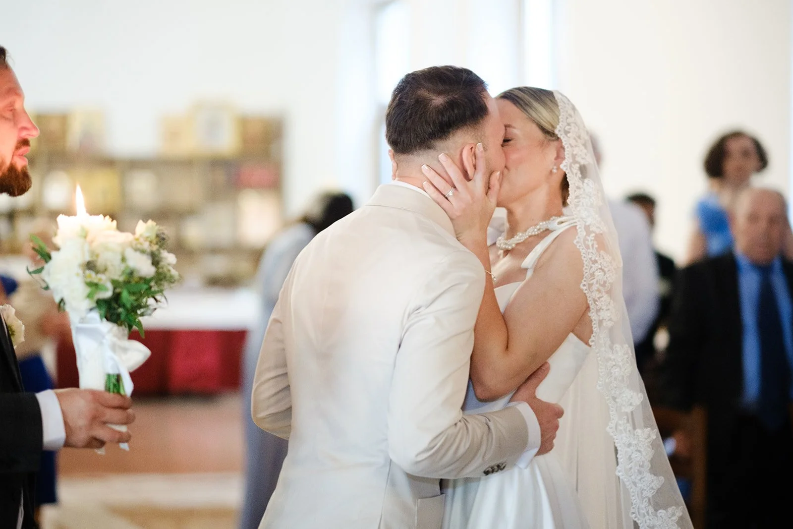 Tania Muser Italian wedding floral designer Verona Italy couple kissing end ceremony Verona Northern Italy
