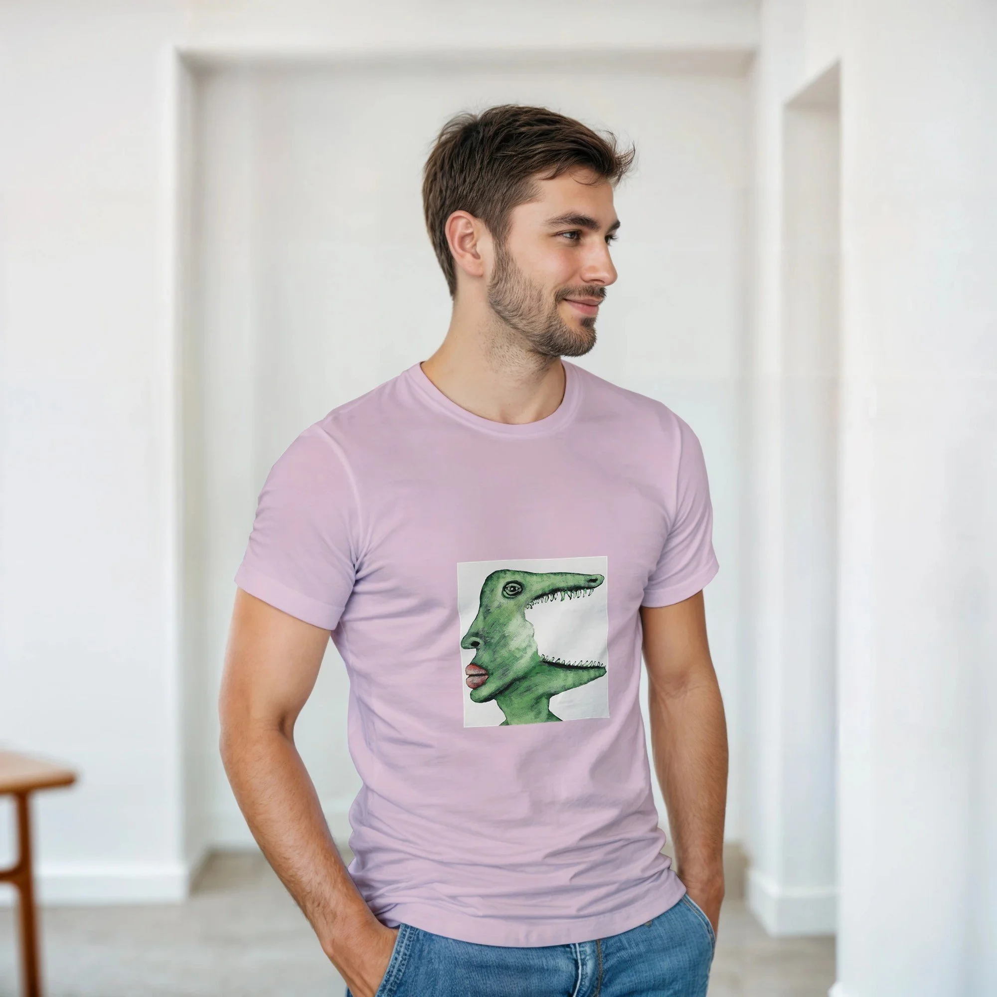 Unisex light pink t-shirt featuring a green surrealist crocodile art print by Roi Pajursky, modeled in various lifestyle settings.