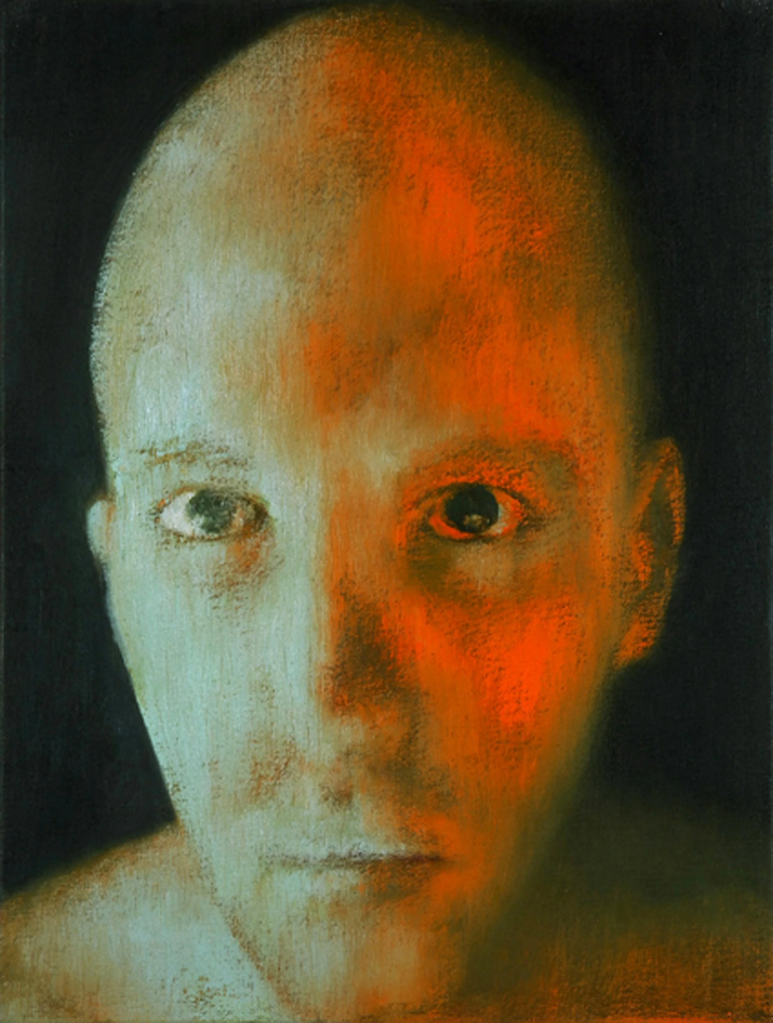 An abstract male head study using soft orange hues to create a mysterious and hazy atmosphere.