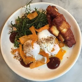 Polenta corn fritter, avacado and smashed greens at The Grain Store.