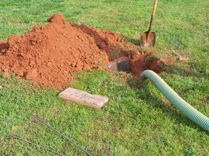 A septic system being serviced