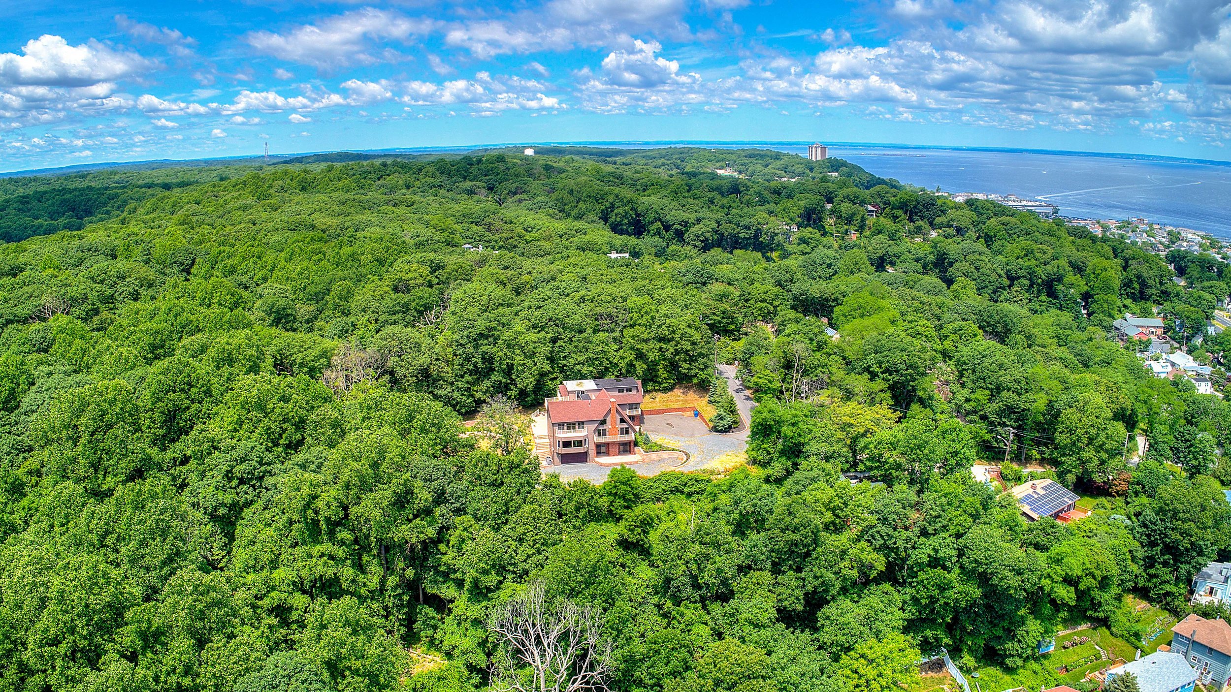 Aerial of House on top a mountain overlooking the ocean in Highlands New Jersey Drone Photography