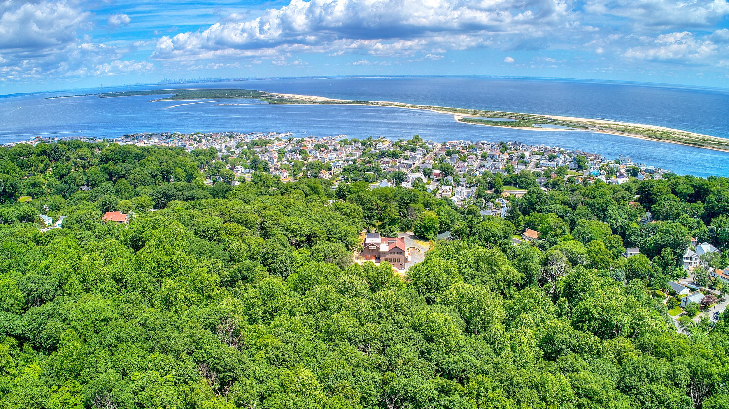 Drone Photography Highlands New Jersey Real Estate Home on the hill across from the ocean