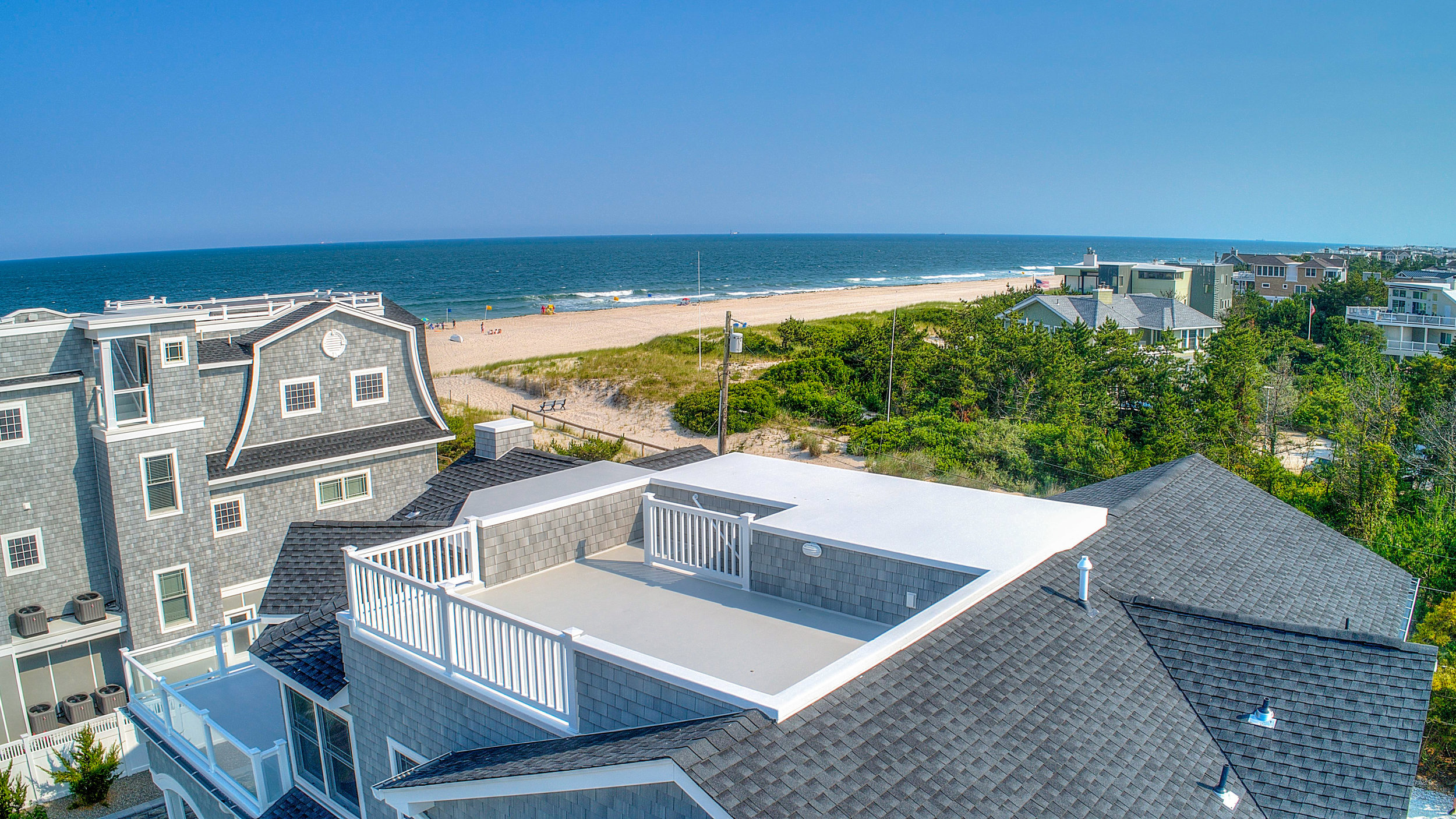 Roof top deck ocean view long beach island new jersey drone aerial photography real estate