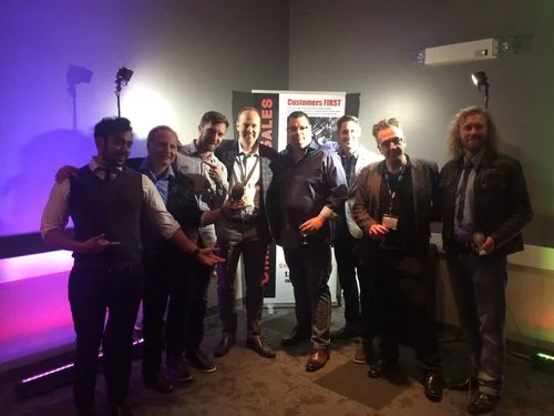 L to R: Ian Bawa, Dean Gunnarson, Brad Crawford, Jeff Newman, Scott R. Leary, BJ Verot, John R. Barnard, Trevor Kristjanson