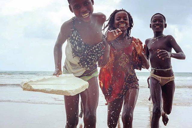 Baaba, Naomi and Kukua taking a break from collecting sea snails from the exposed rocks during a low springtide. 
Western Region, Ghana, 2015.
.
This is still one of the favorite shots I ever took. We were playing in the shore break with a broken foa