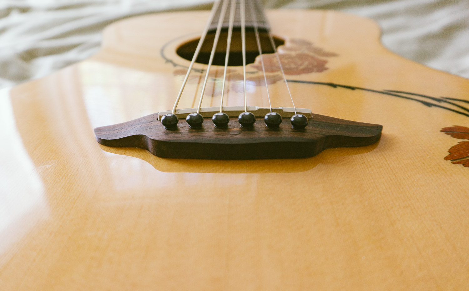 I actually don't know how to play the guitar (yet) ... but I can restring one.