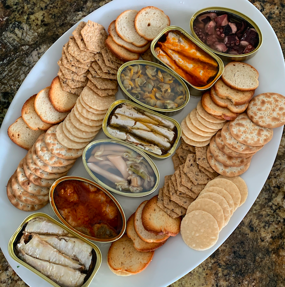 SHARK-UTERIE - A collection of tinned fish and shellfish, fine crackers, pickled and fermented vegetables, cured meats, smoked fish and fine cheeses.