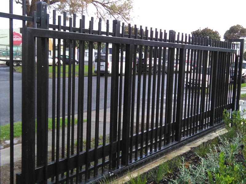 fence with automated sliding gate