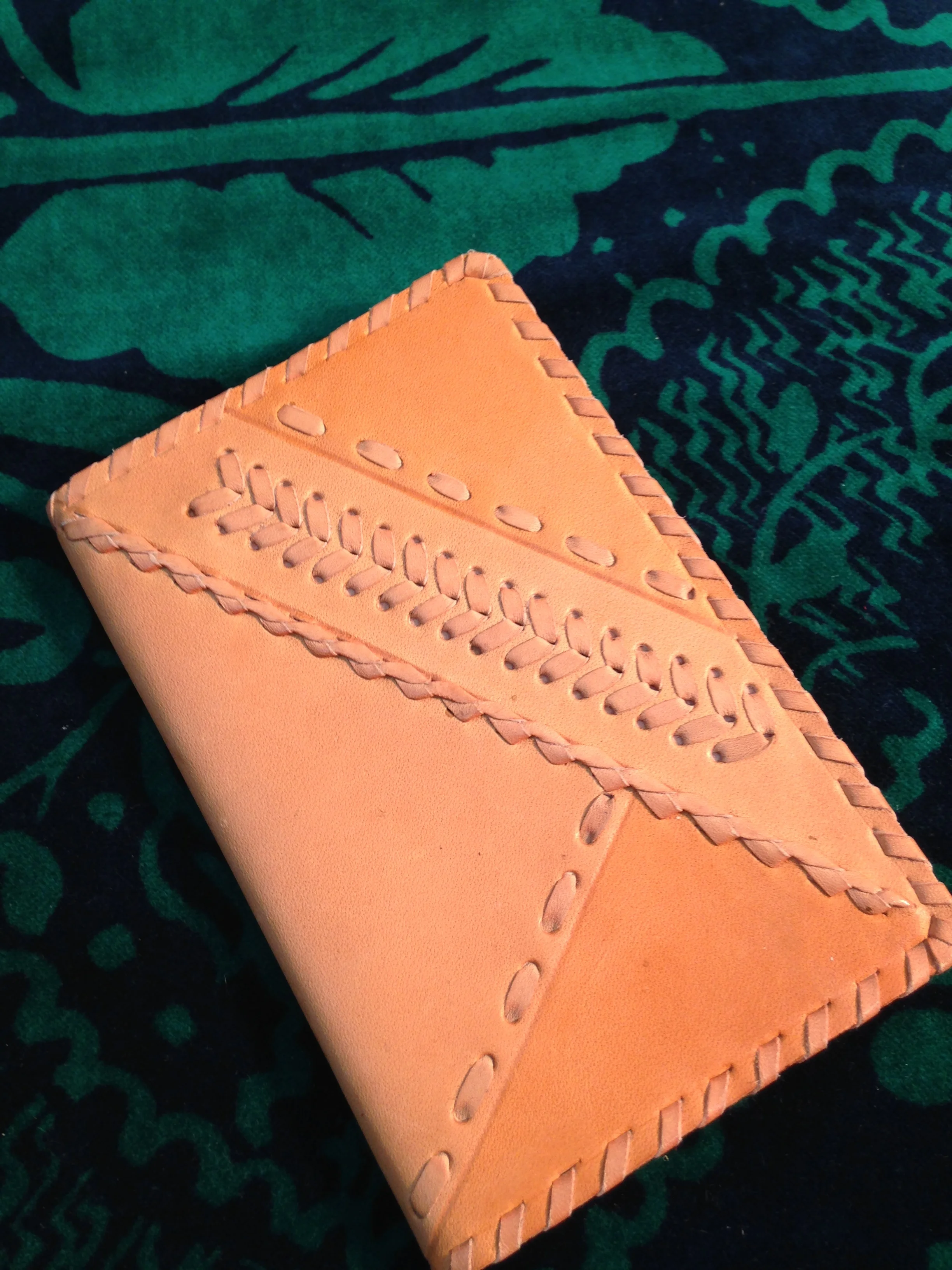 Vintage, handcrafted leather address book from Latvia.