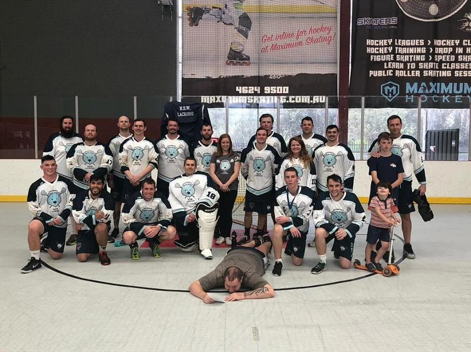 The New South Wales Men's Indoor Lacrosse Team... after a long day of tough competition.