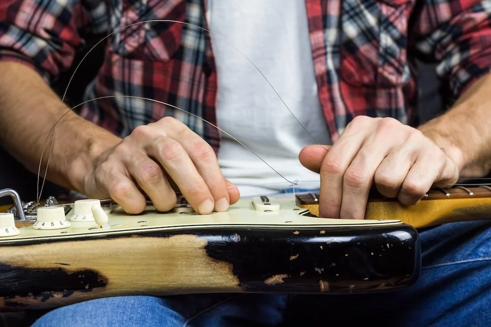 Guitar setup and tuning by an experienced repair technician