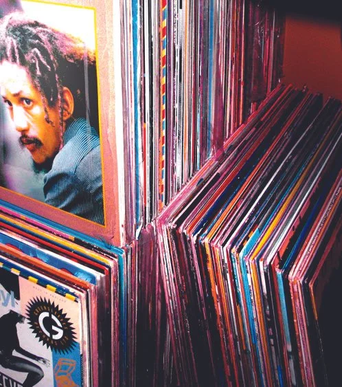 Crates of vinyl records from a private collection awaiting sorting and display
