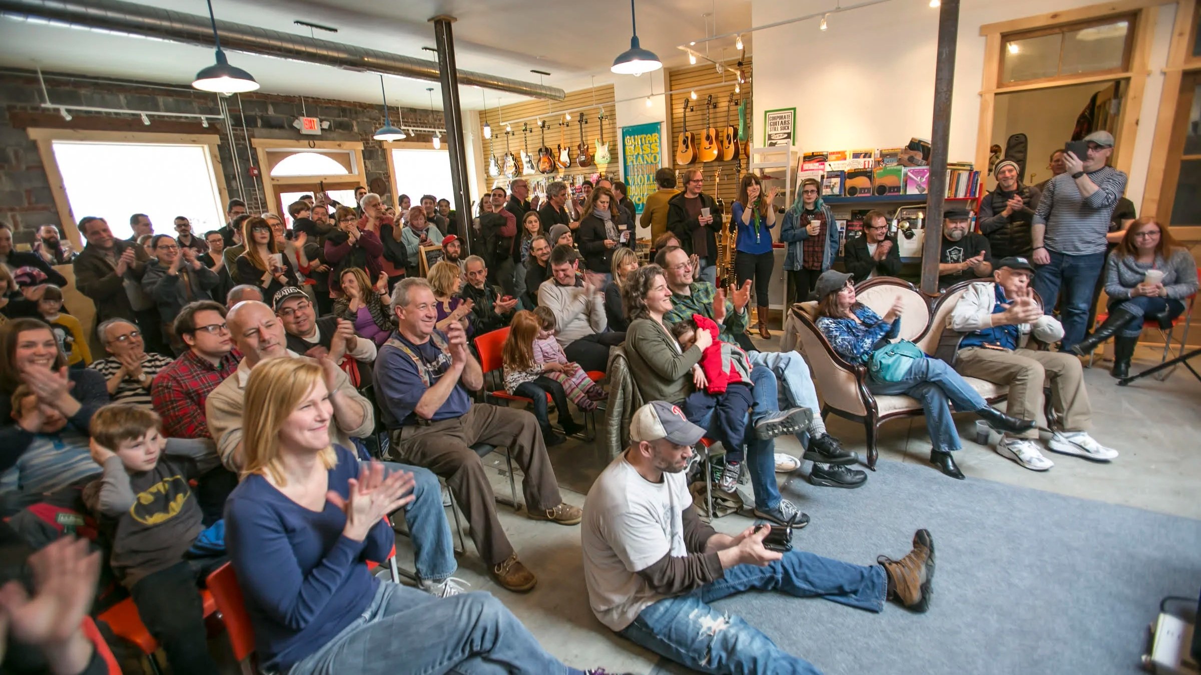 Students and audience at a live performance inside Collingswood Music