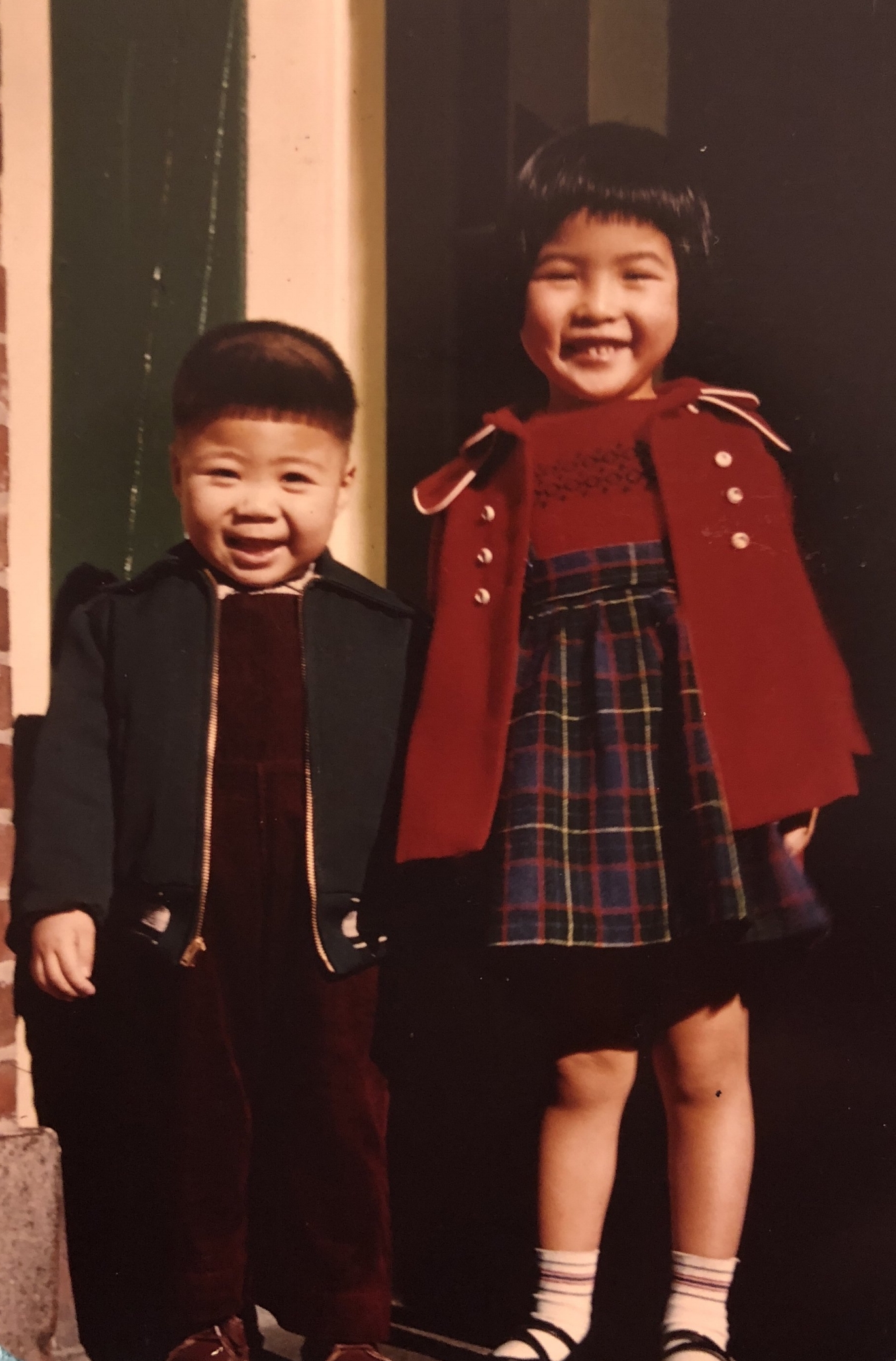 Albert and Cynthia standing in the doorway of her Hudson Street home.