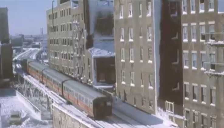 Elevated train running through Chinatown