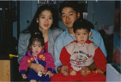 Erica with her parents and brother; photo courtesy of author