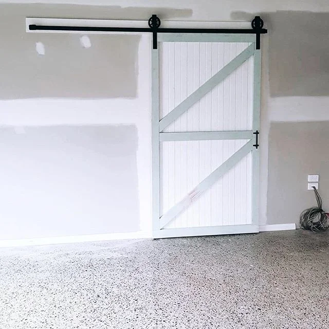 Custom made barn door, black hardware and polished concrete 👌🏼
Can&rsquo;t wait to see this one painted