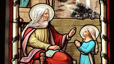 Our Blessed Virgin Mother obediently listens to her mother, St. Anne