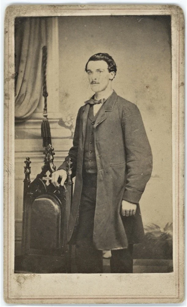 “Standing Gentleman Attired in a Long Sack Coat”