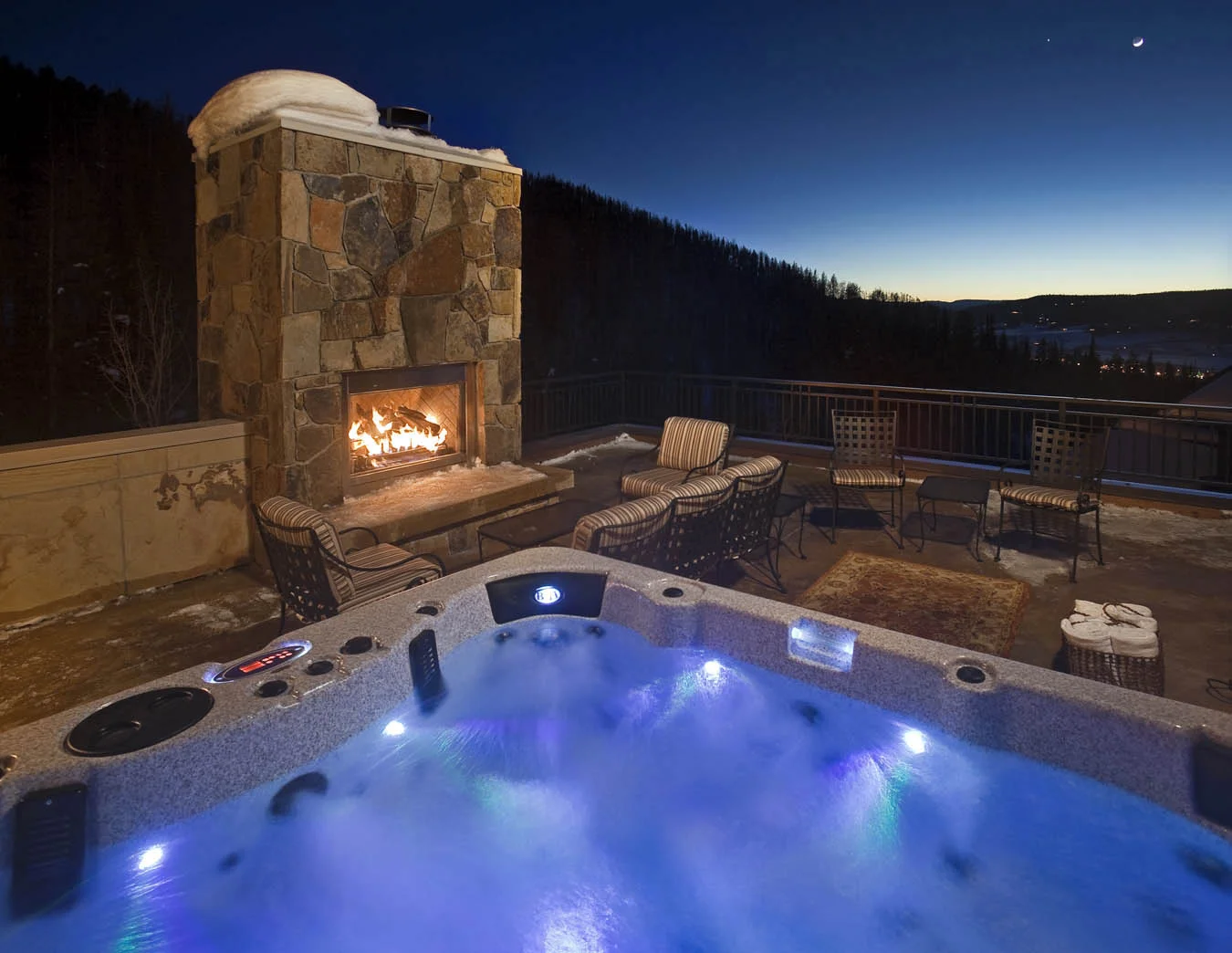 Roof top fireplace and hot tub.