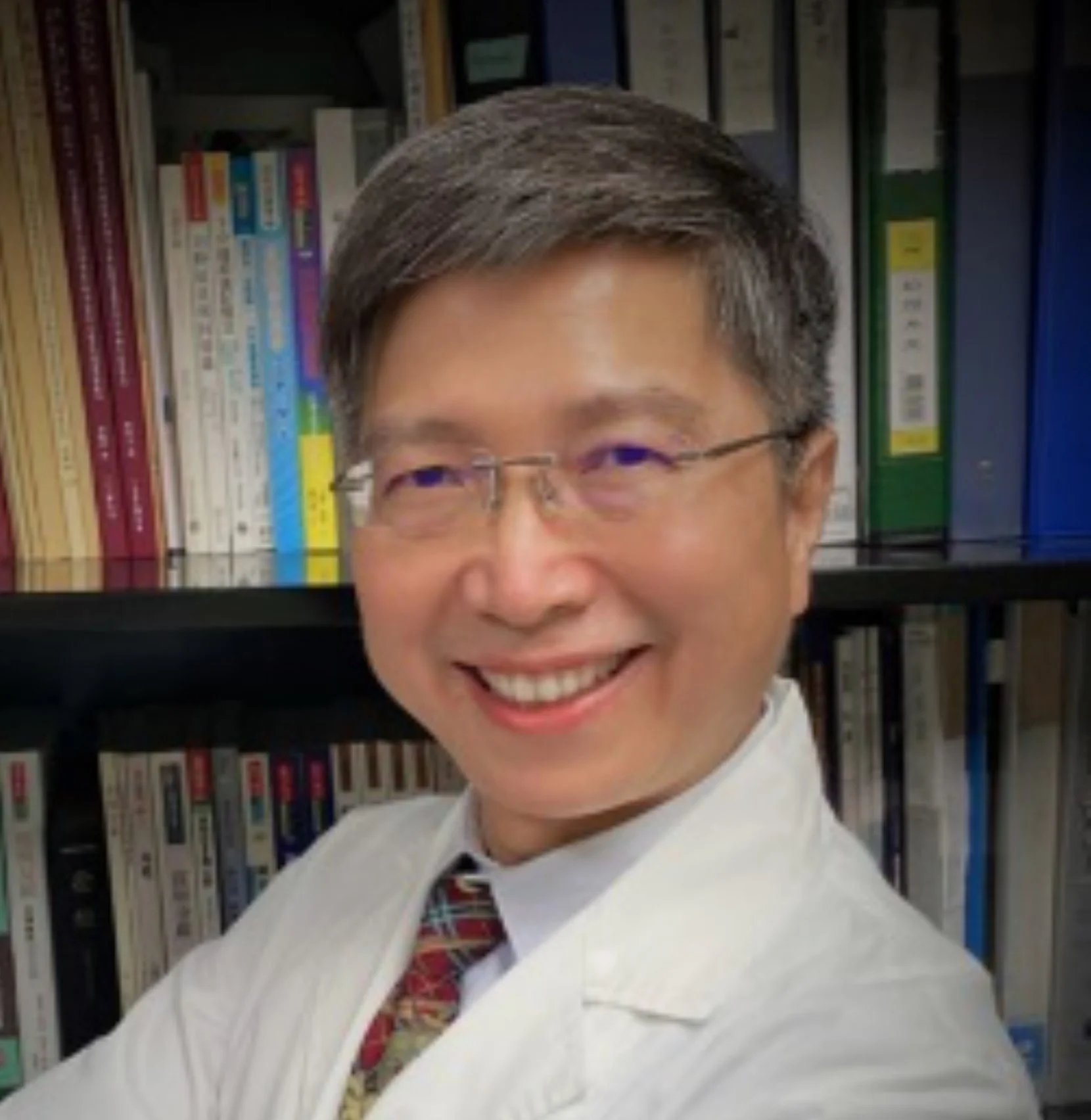 Dr. Tak-Wah Wong, MD, PhD