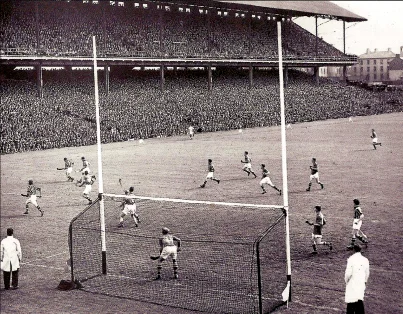 1950 All-Ireland Final. Tipperary beat Kilkenny 1-9 to 1-8 before 68,599 spectators. Jimmy Langton [Kilkenny, No 12) threatens the Tipperary goal.