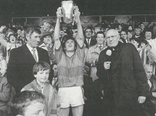 Loughmore Castleiney captain Eamon Sweeney lifts the Dan Breen Cup following this teams victory in the County Final 