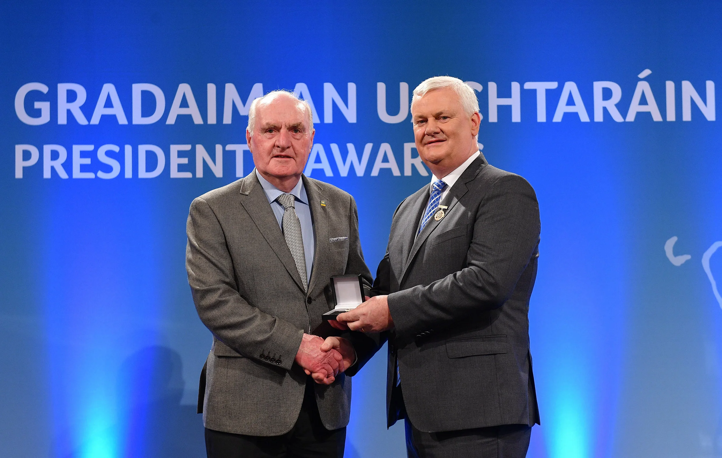 Seamus J. King receives a GAA President's Award from Uachtaran Aogán Ó Fearghail