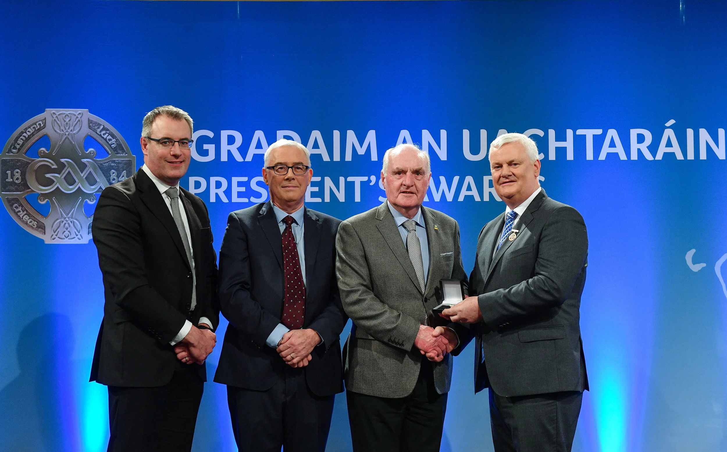 From left to right; Pádhraic Ó Ciardha, Leascheannasaí TG4, Patrick Farrell, Head AIB Area South, Seamus J.King, Uachtaran Aogán Ó Fearghail.