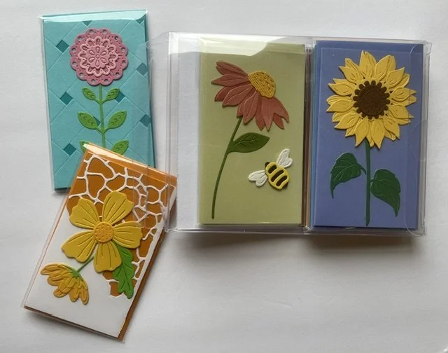 back of clear box with cards outside.jpeg