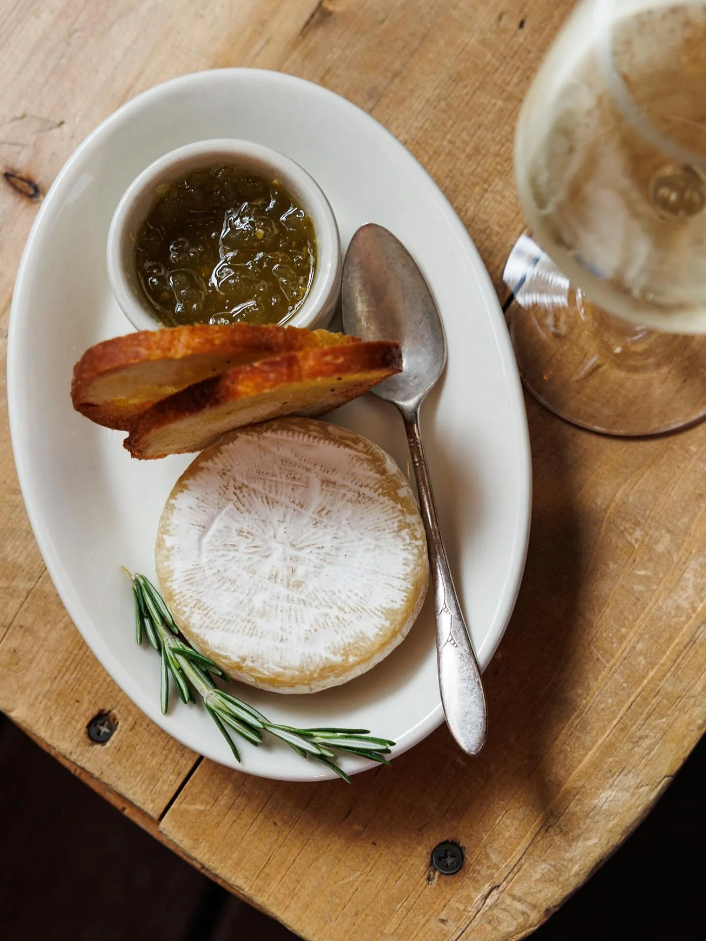 Fresh from our specials menu!  Warm tomino cheese with toast and green tomato sweet salsa.  Enjoy with measure or just order seconds!  Available at Fiaschetteria West!  First come first serve!