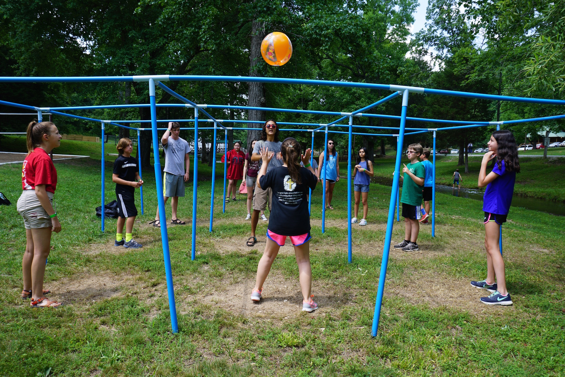  Young pre-teen girls playing a game with a ball at Summer Camp - NaCoMe Camp &amp; Conference Center 