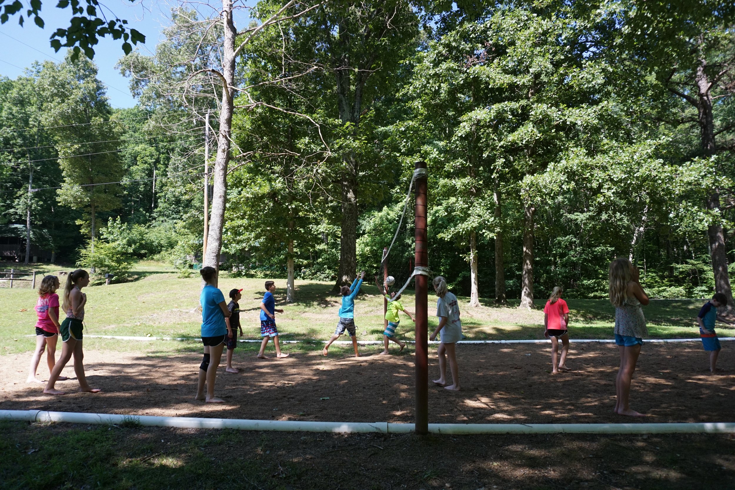  Young Summer Campers playing vollyball - NaCoMe Camp &amp; Conference Center 