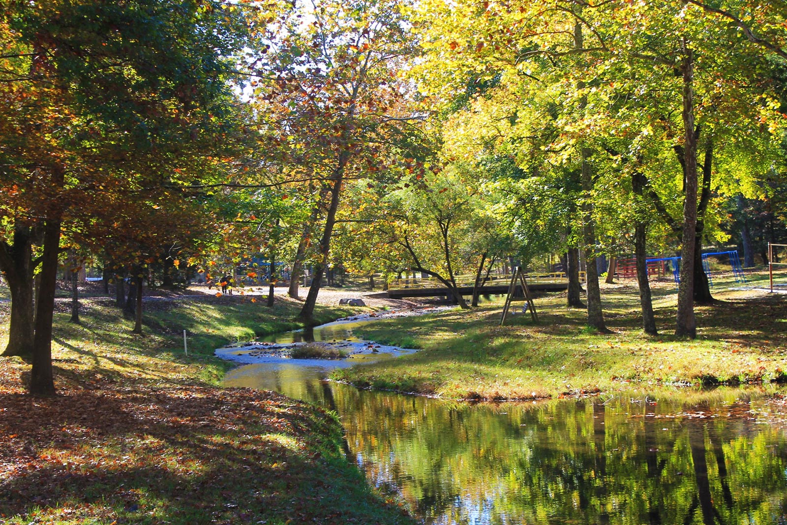 Beautiful scenic creek with a bridge - NaCoMe Camp & Conference Center