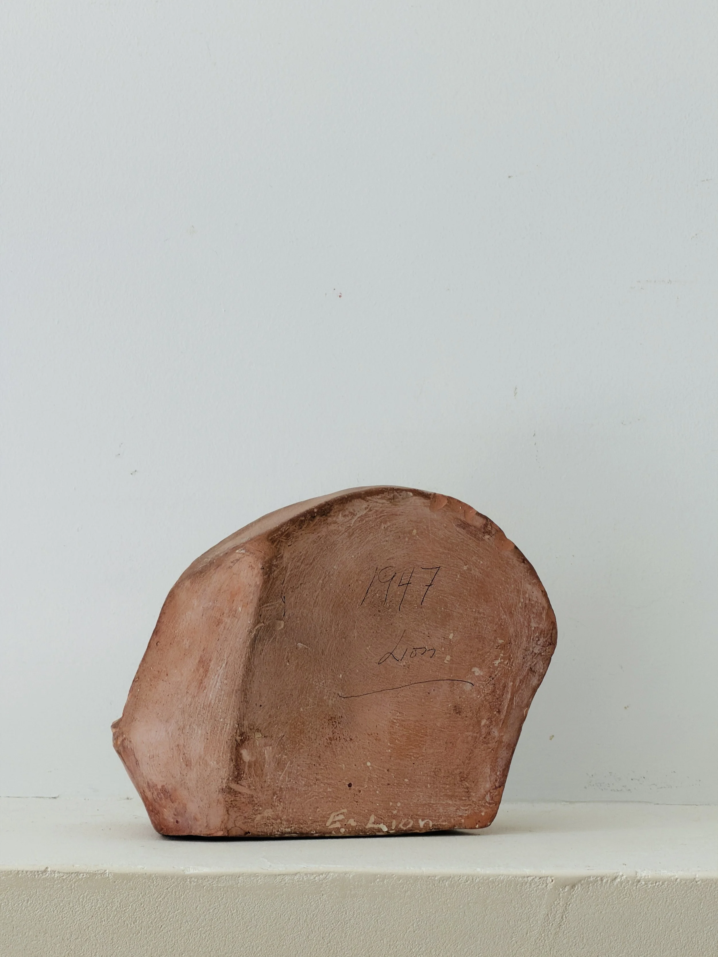 MATERI(A)NTIQUES SMALL MID CENTURY TERRA COTTA ANGLUAR HEAD SCULPTURE.4.jpg