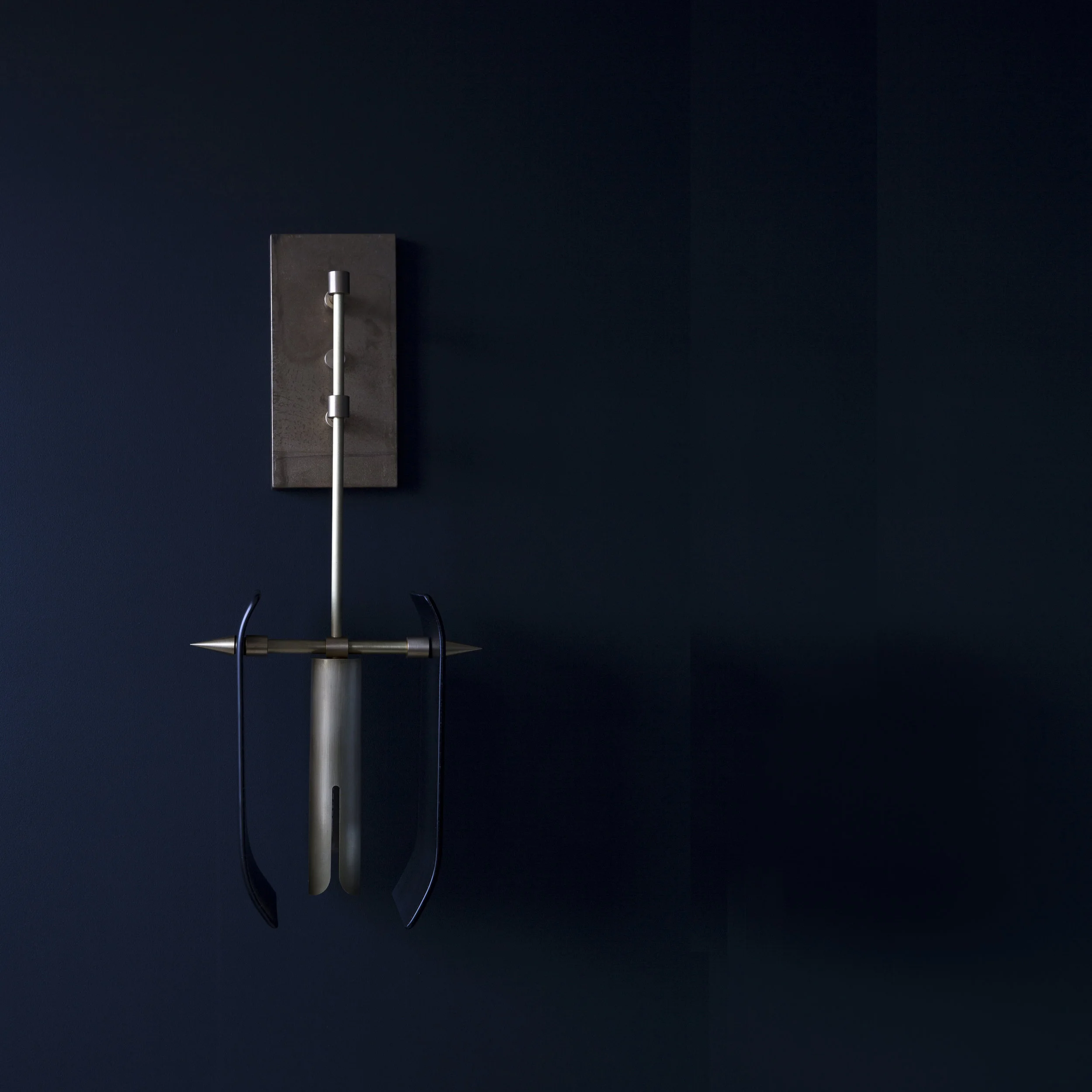 TORO SCONCE CHID OFF SQ.jpg