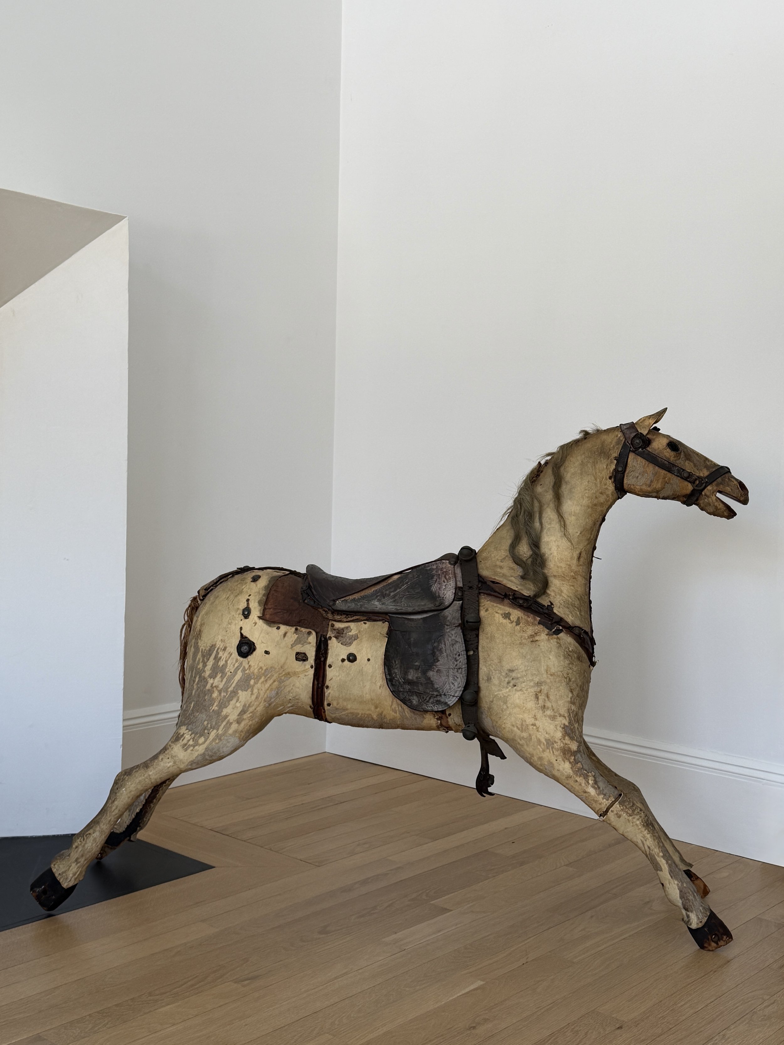 MATERI(A)NTIQUES EXTRA LARGE STITCHED LEATHER, HAIR AND WOOD TOY HORSE.12.jpg