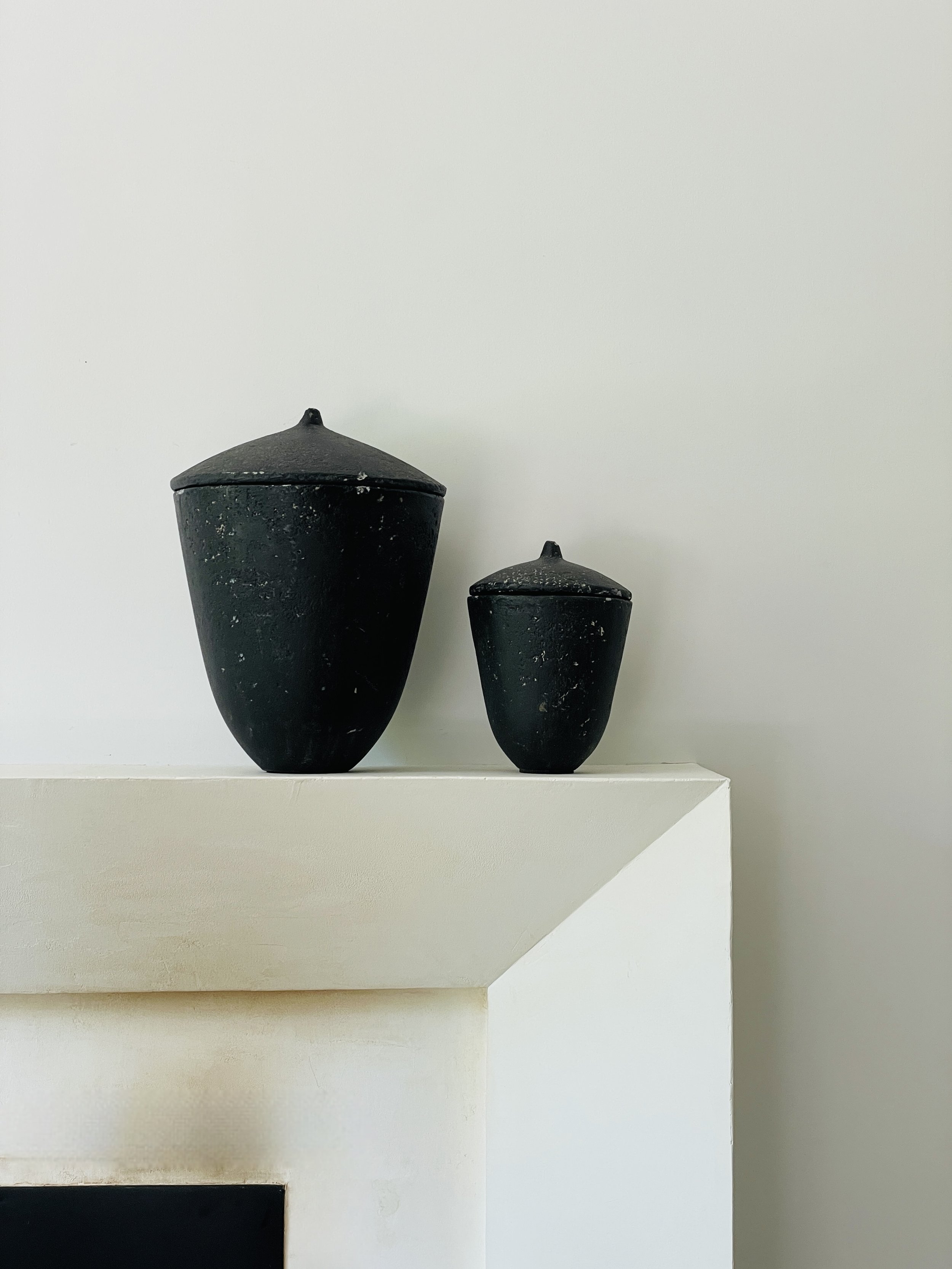 MATERI(A)NTIQUES SET OF 2 ACORN SHAPED BLACK COMPOSITE VESSELS(3).jpg