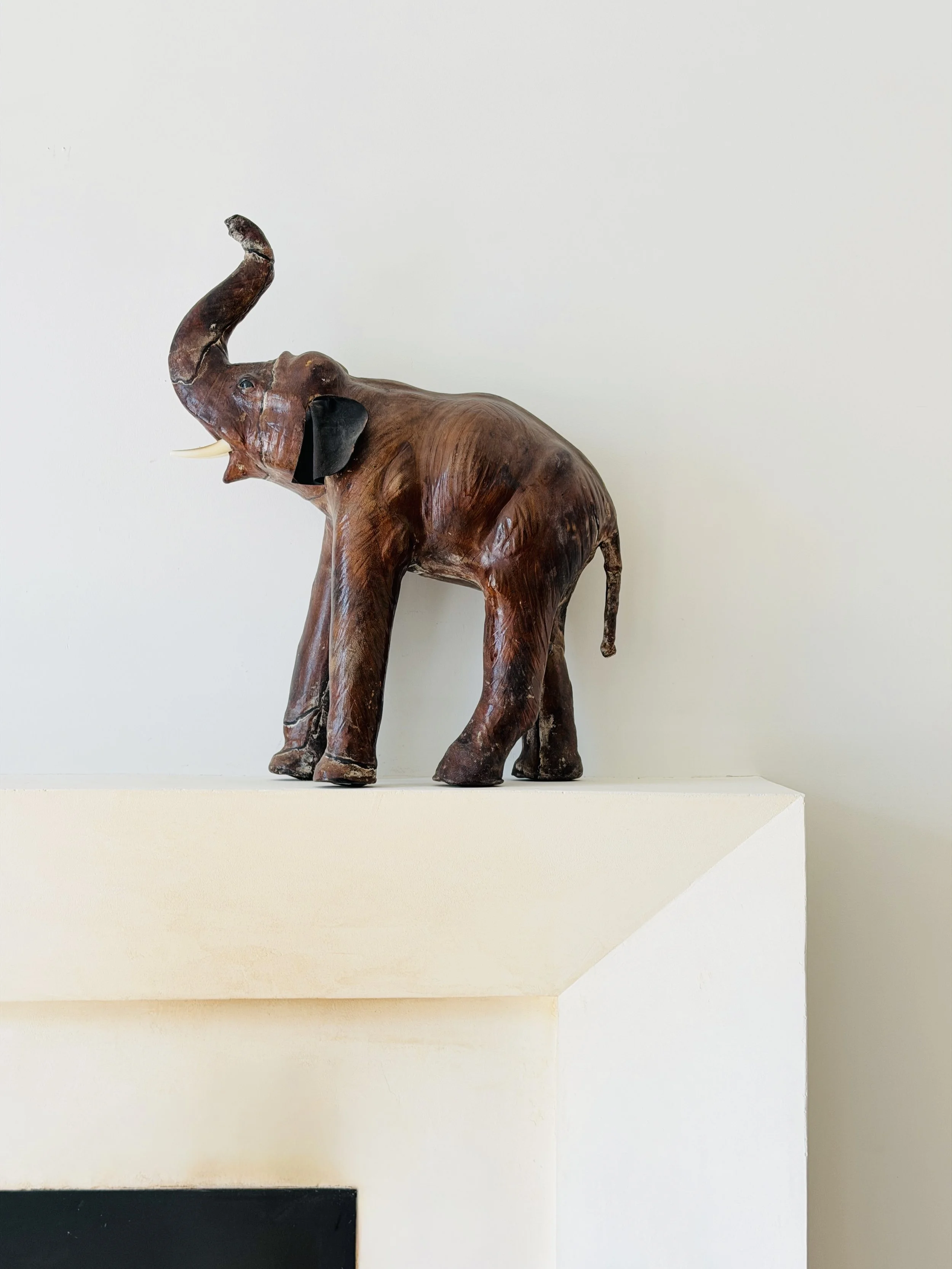 MATERI(A)NTIQUES LARGE DARK BROWN LEATHER ELEPHANT FIGURINE.jpg