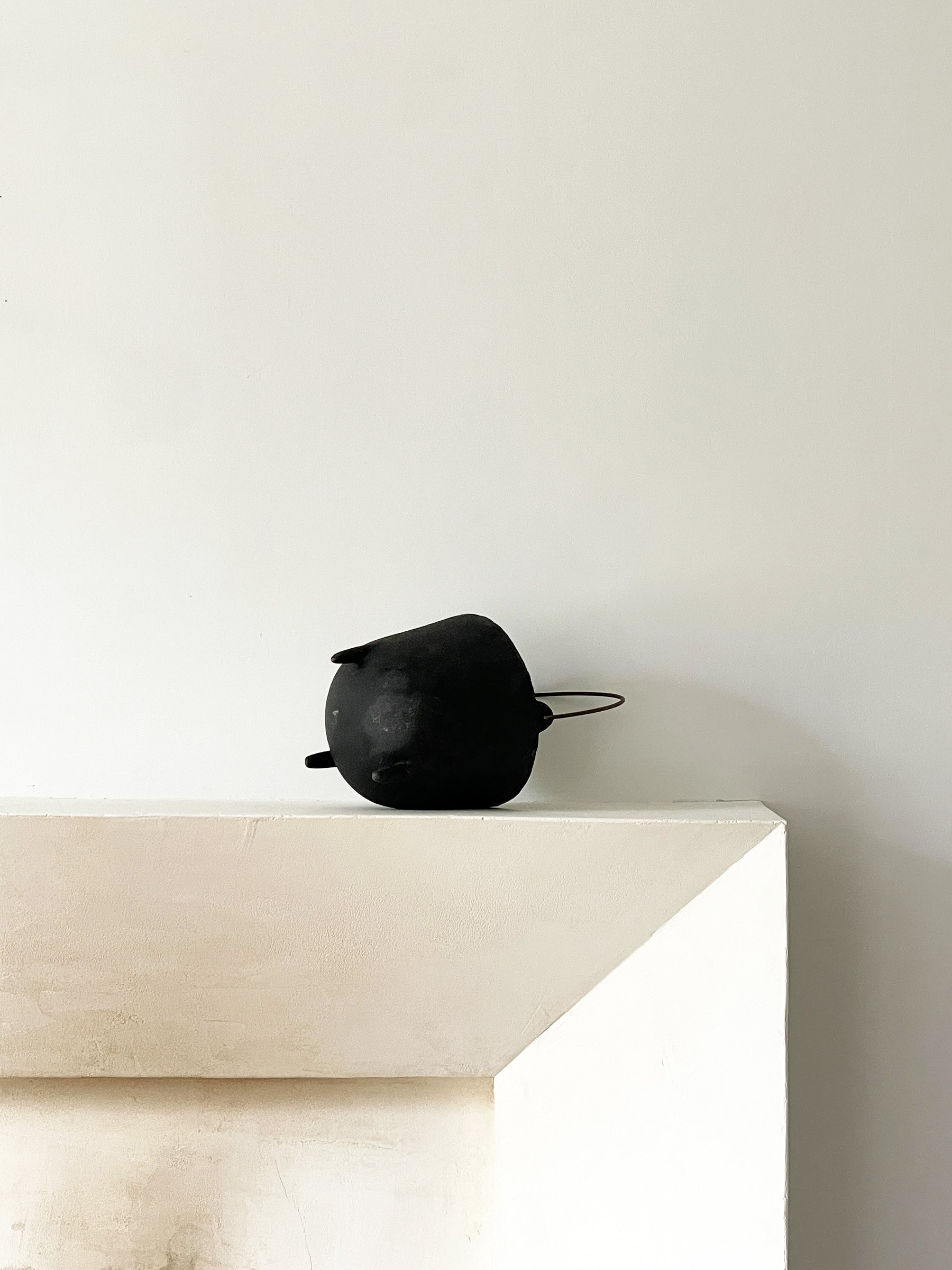 MATERI(A)NTIQUES BLACK IRON FOOTED COULDRON WITH HANDLE.jpg